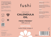 Fushi Organic Calendula Oil label on a pink background