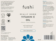 Fushi Really Good Vitamin E Oil packaging with branding and product details.