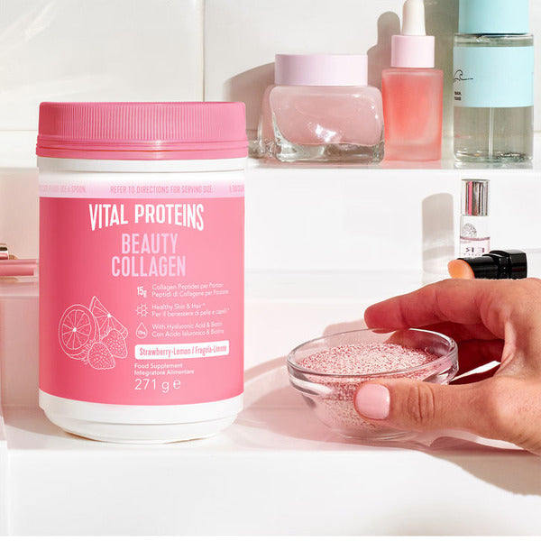 Lifestyle/use image: Vital Proteins Beauty Collagen Peptides powder strawberry lemon tub 271g lifestyle use