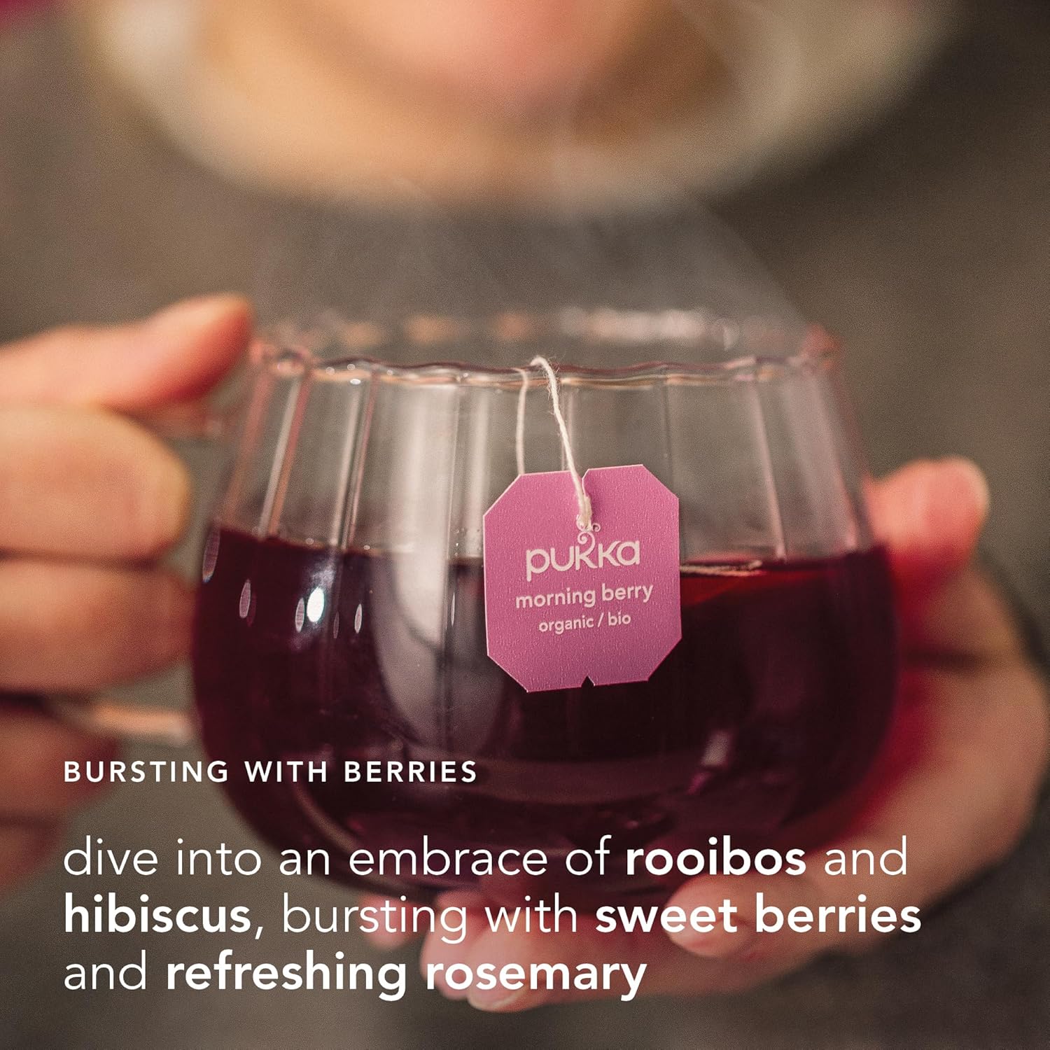 How to Use: Pukka Morning Berry tea sachet steeping in a cup.