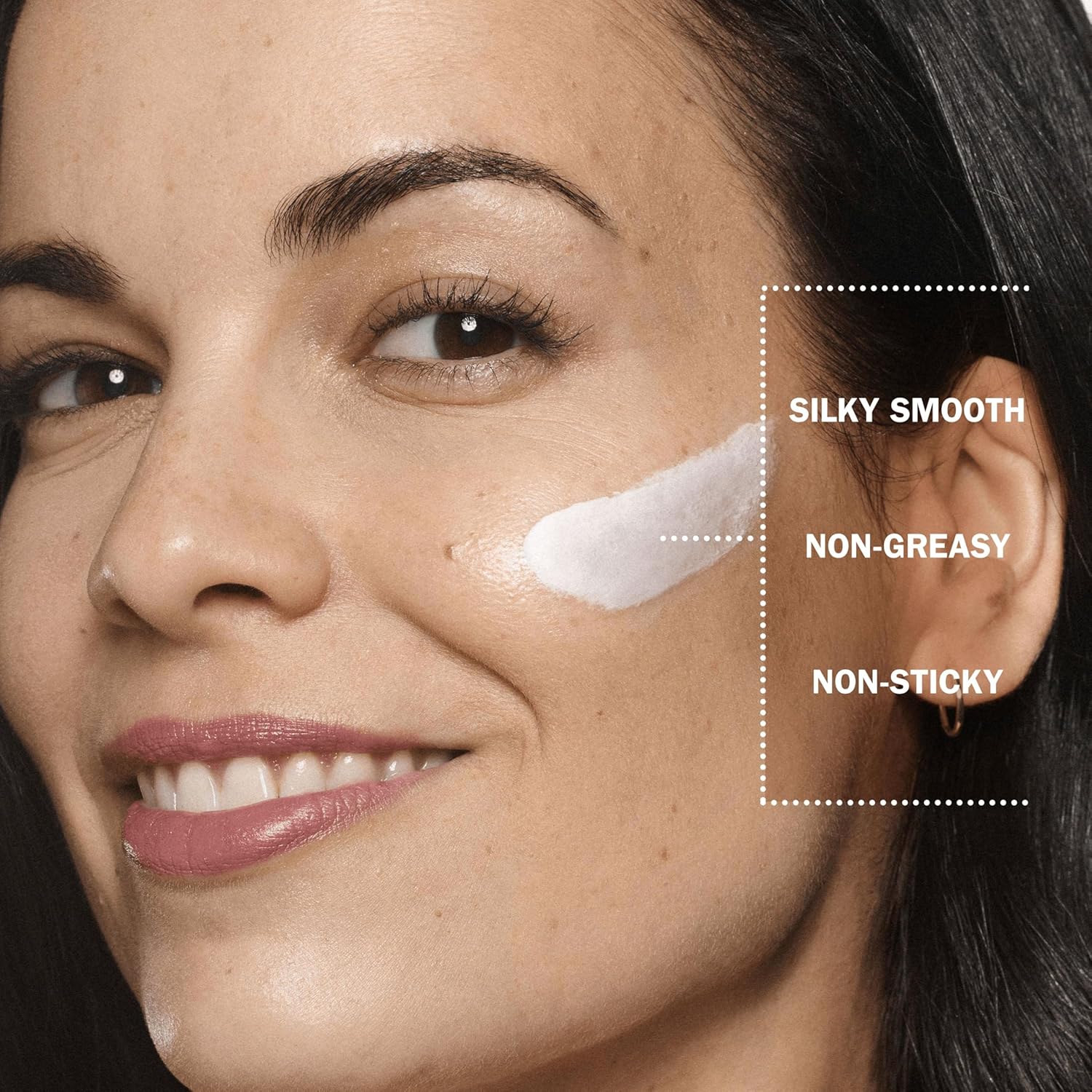 Applying Olay Regenerist Day Cream with SPF to face in morning light.