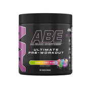 Black pre-workout supplement container with colorful label on a gray background