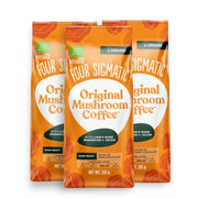 Four Sigmatic Original Mushroom Ground Coffee Dark Roast 283g, 3 pouches front packaging on white background