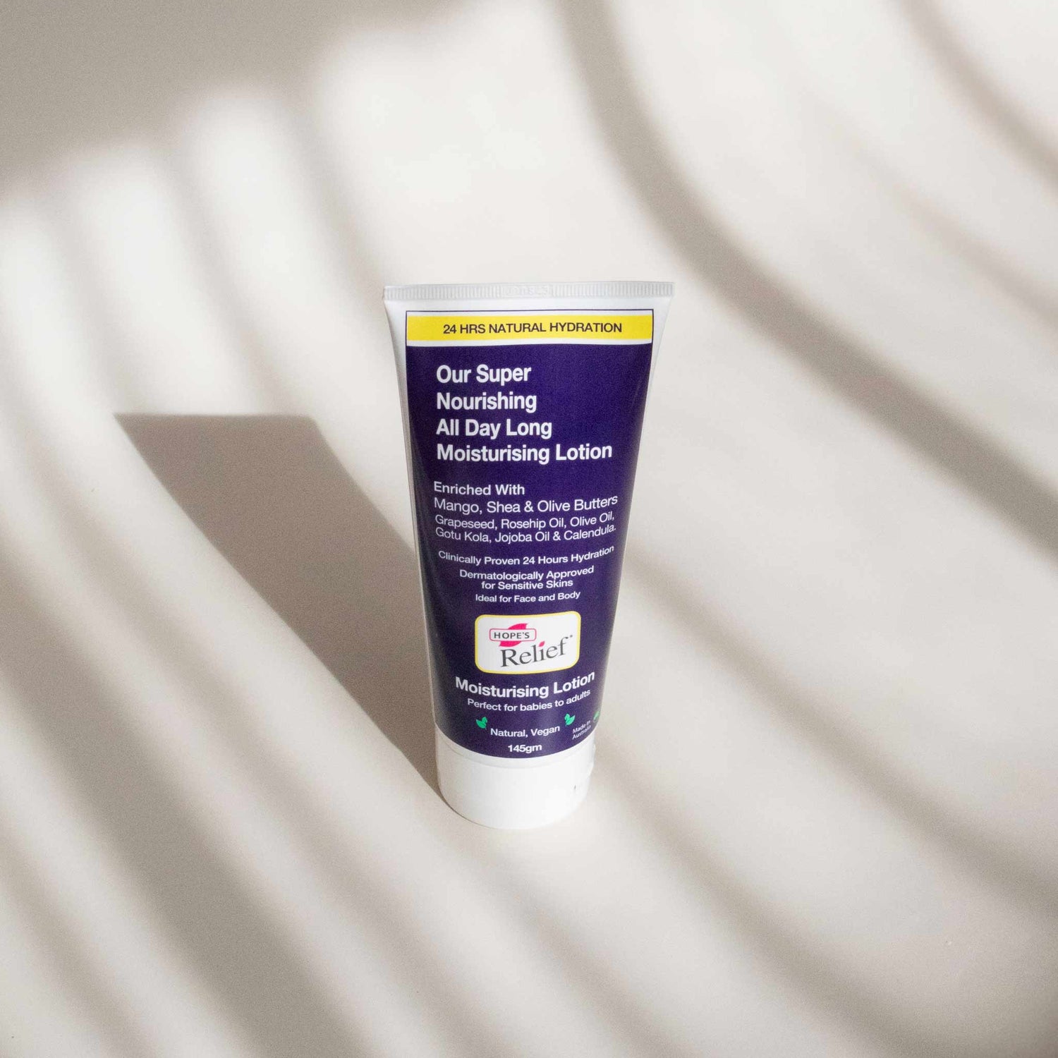 Tube of moisturizing lotion on a light background
