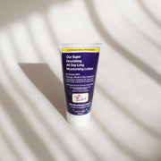 Tube of moisturizing lotion on a light background