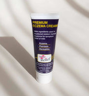 Tube of Hope's Relief Premium Eczema Cream on a beige background