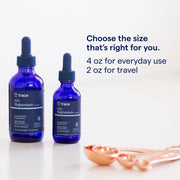 Two blue bottles of trace magnesium supplement with droppers on a white background.