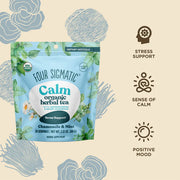 Four Sigmatic Calm organic herbal tea package with illustrations of stress, sense of calm, and positive mood on a beige background.
