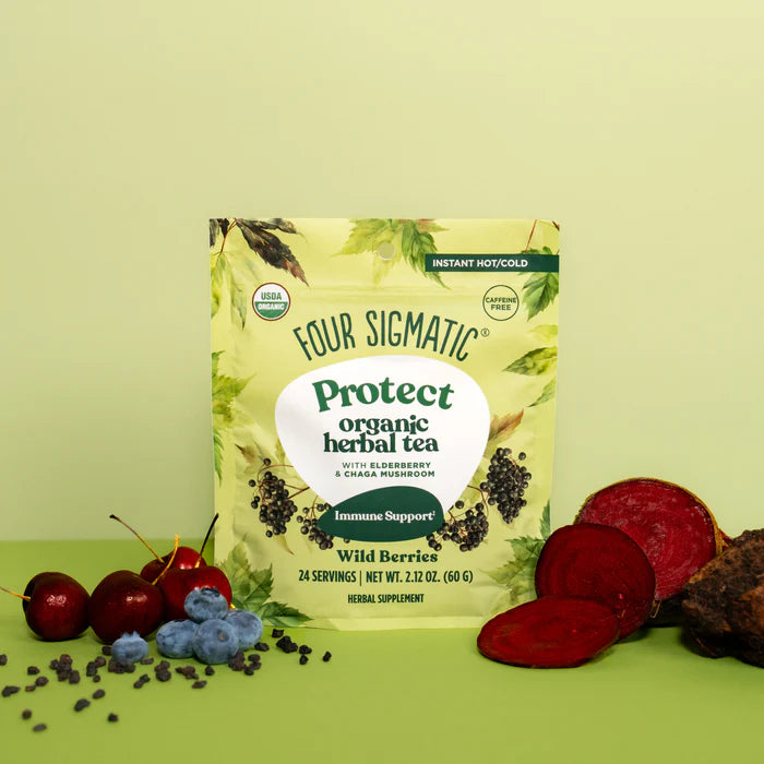 Four Sigmatic Protect organic herbal tea package with wild berries on a green background