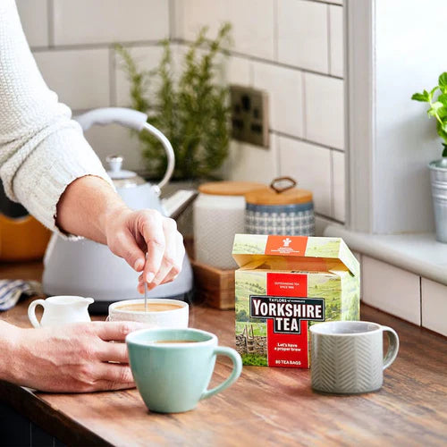 Yorkshire Tea Original Black Tea Bags box packaging black tea 210 tea bags prepared tea serving suggestion