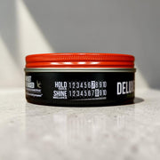 Uppercut Deluxe Pomade 100g jar strong hold high shine styling product packaging