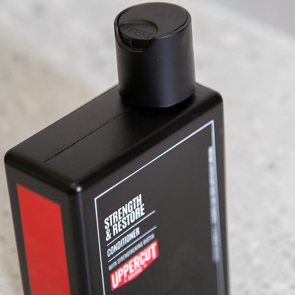 Uppercut Deluxe Strength and Restore Conditioner 240ml bottle mandarin patchouli fragrance packaging