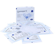 Cosmopor E Sterile Adhesive Dressings box & sachet, 10 cm x 8 cm, pack of 25, on white background.