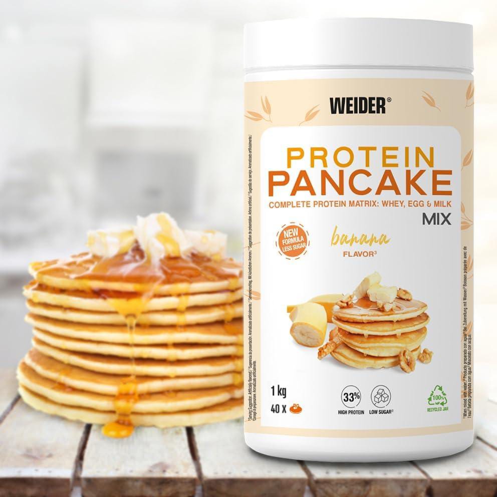 Weider Protein Pancake Mix Banana Flavour 1kg plastic tub with a stack of golden banana protein pancakes with syrup drizzle.