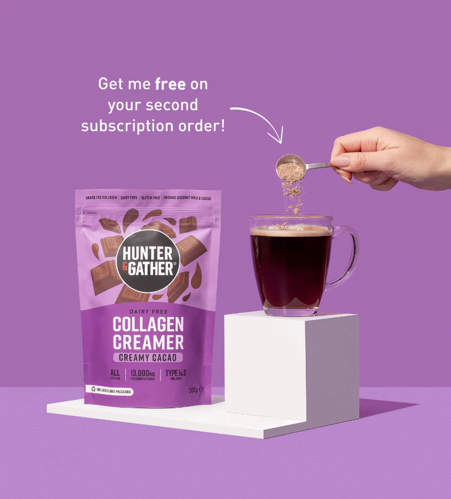 Hunter and Gather Collagen Creamer package with a hand adding creamer to a cup of coffee on a purple background.