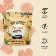 Four Sigmatic Focus organic black tea package with illustrations and icons on a beige background