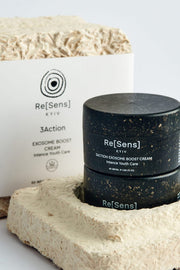 Re[Sens] skincare product packaging on a stone surface