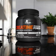 Olimp Nutrition creatine monohydrate powder sports supplement drink lifestyle image 550g tub