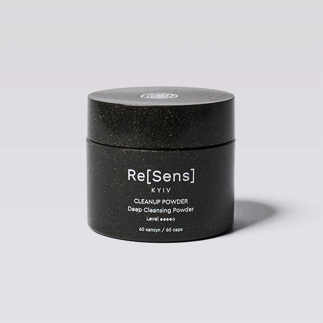 Black container of Re[Sens] Cleanup Powder on a light gray background