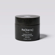 Black container of Re[Sens] Cleanup Powder on a light gray background