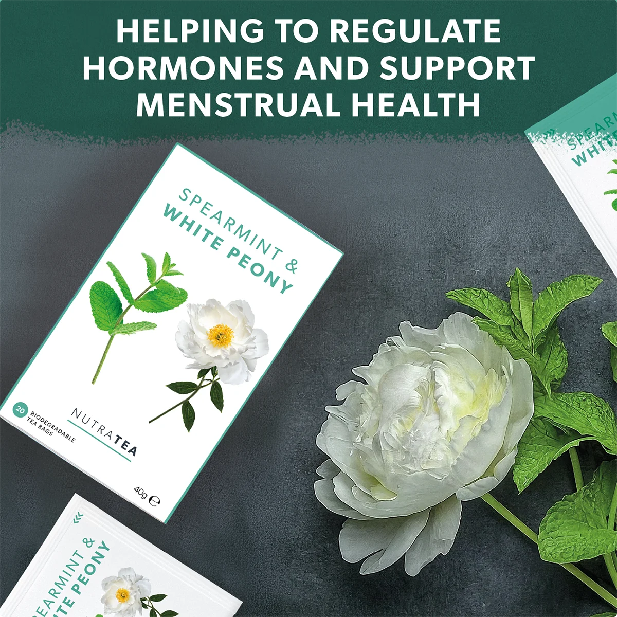 NutraTea Spearmint & White Peony packaging with a white flower on a dark background