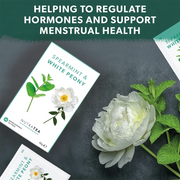 NutraTea Spearmint & White Peony packaging with a white flower on a dark background